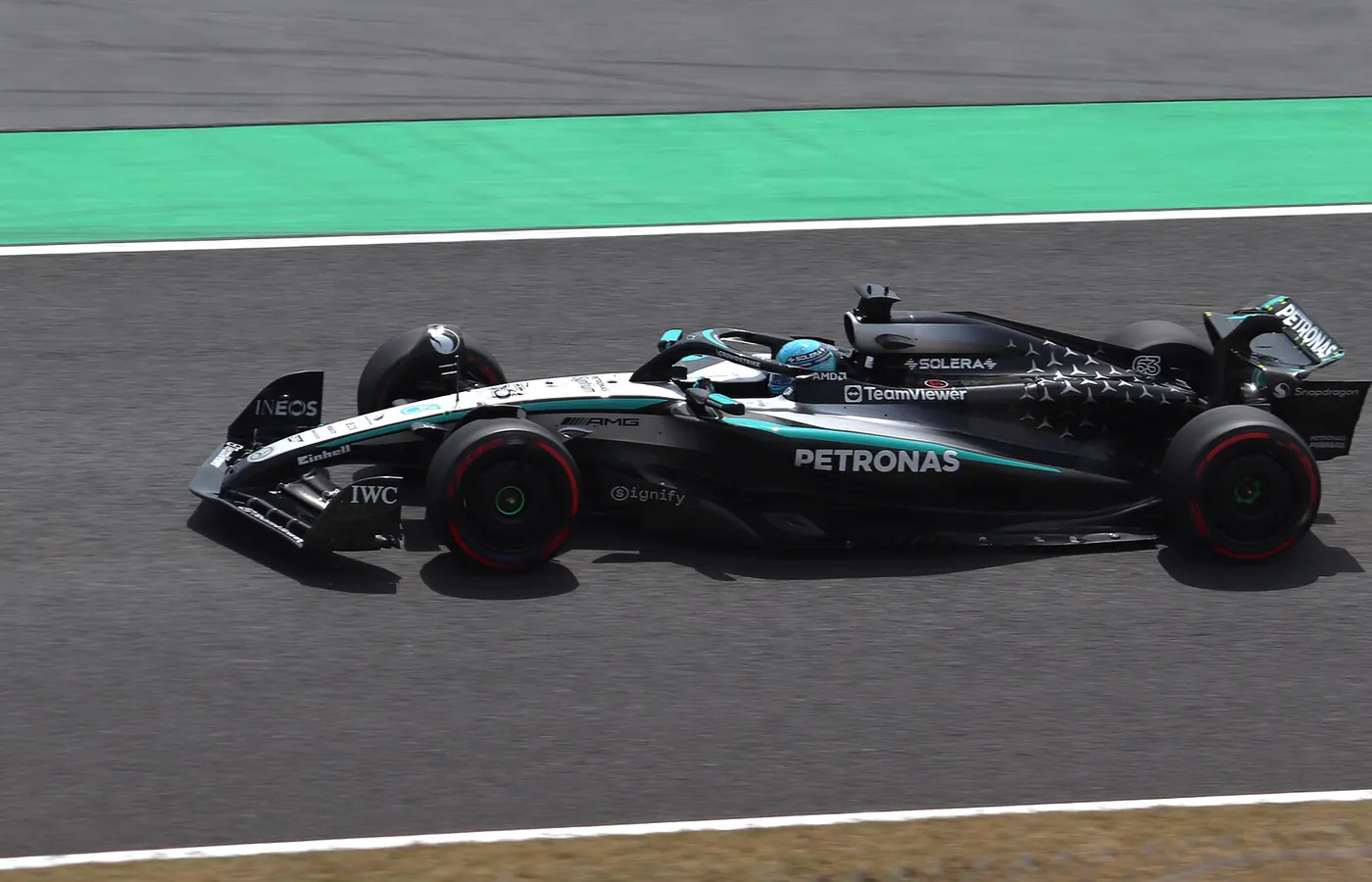 Mercedes-AMG Formula 1 car carrying PETRONAS branding on track
